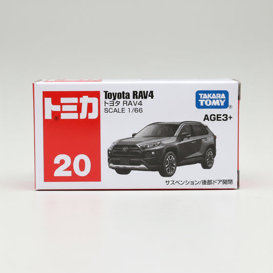 Box of Takara Tomy Tomica Toyota RAV4 toy car model on a white background